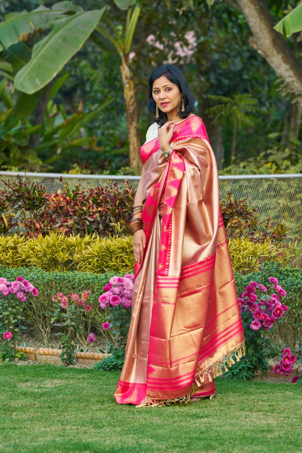 Glowing Rose Gold Saree With Rani Pink Magenta Temple Border