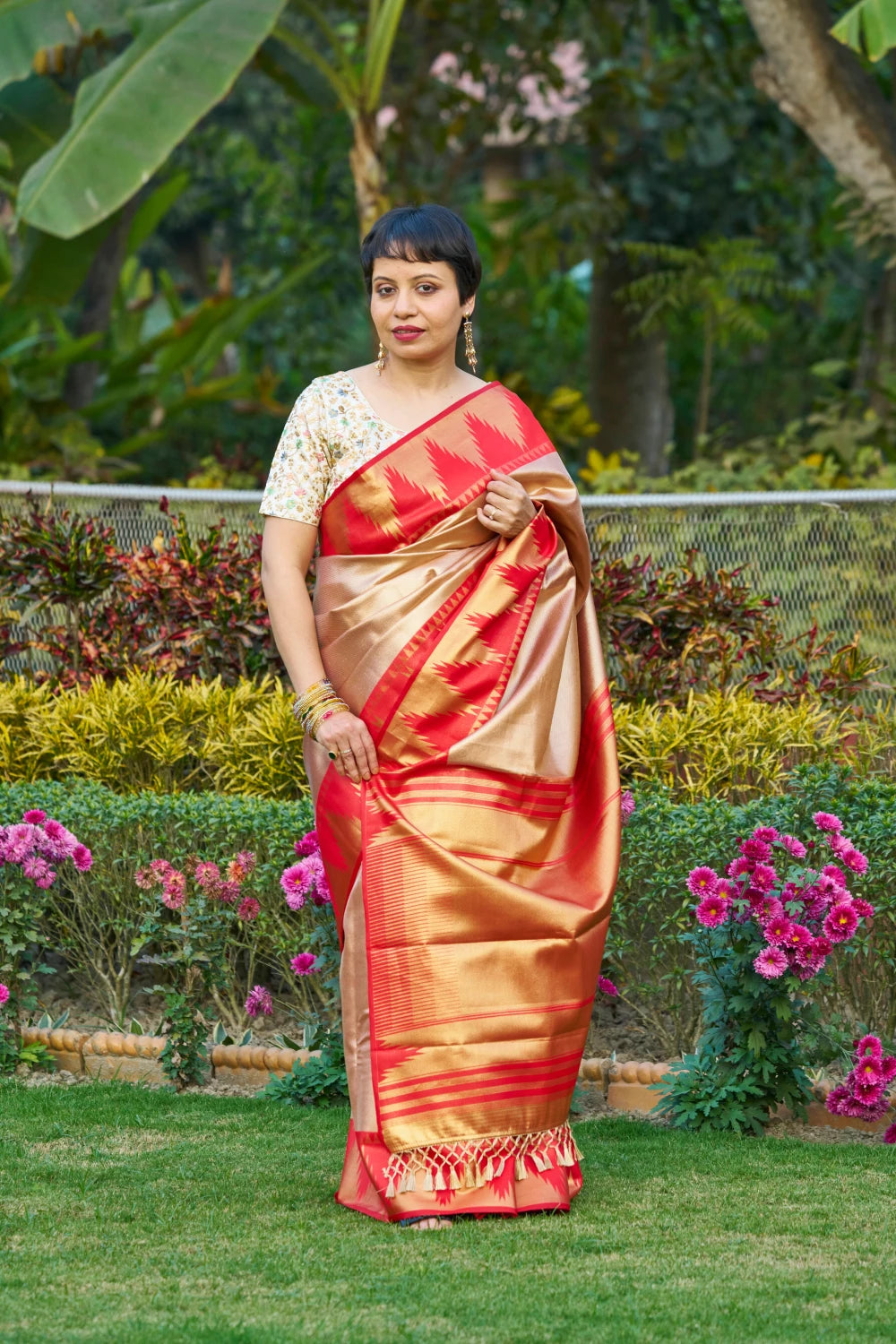 Majestic Champagne Gold Saree With Fiery Red Temple Border