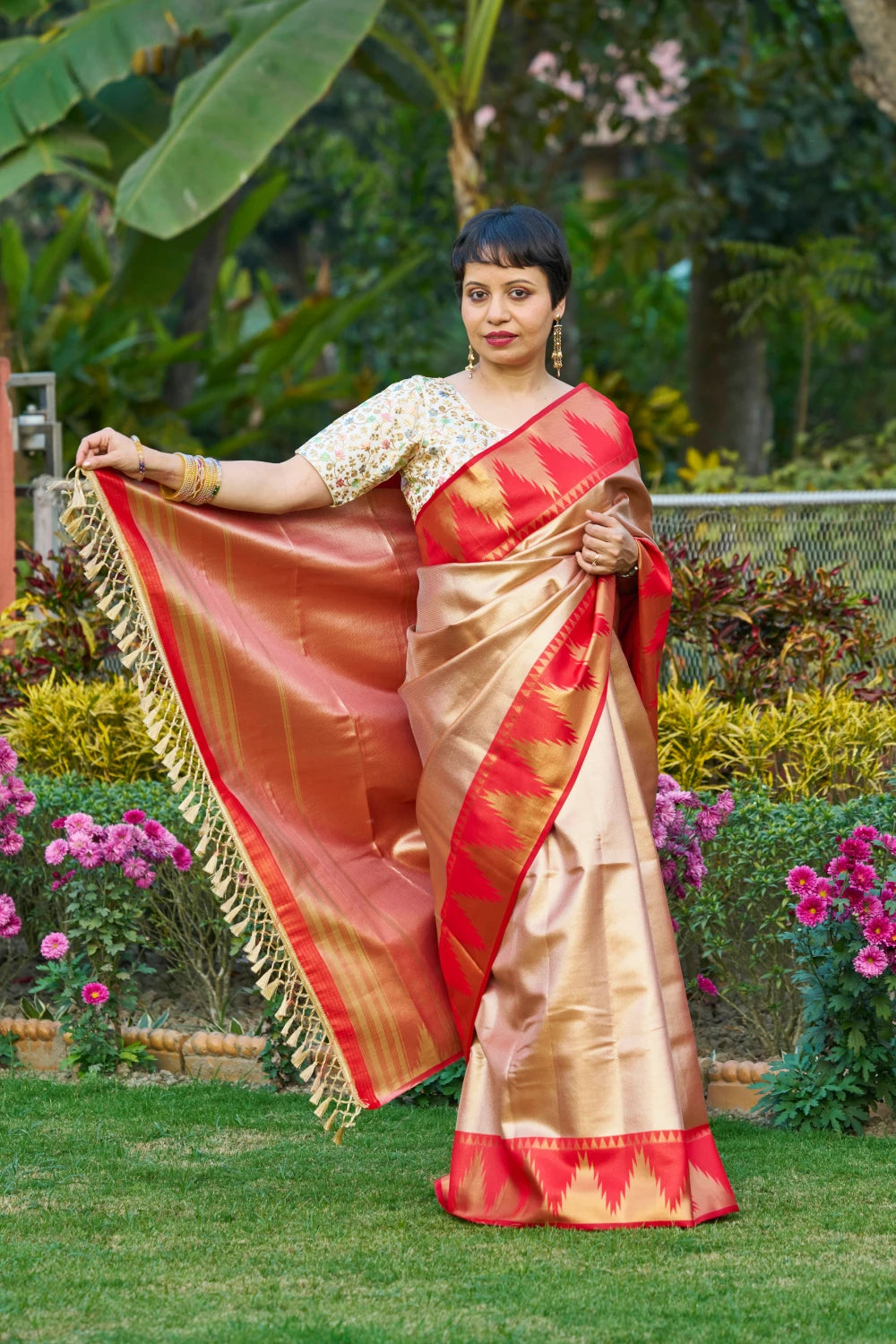 Majestic Champagne Gold Saree With Fiery Red Temple Border