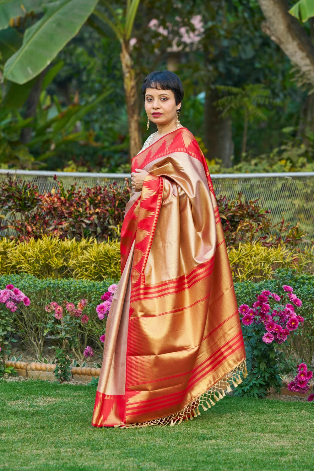 Majestic Champagne Gold Saree With Fiery Red Temple Border