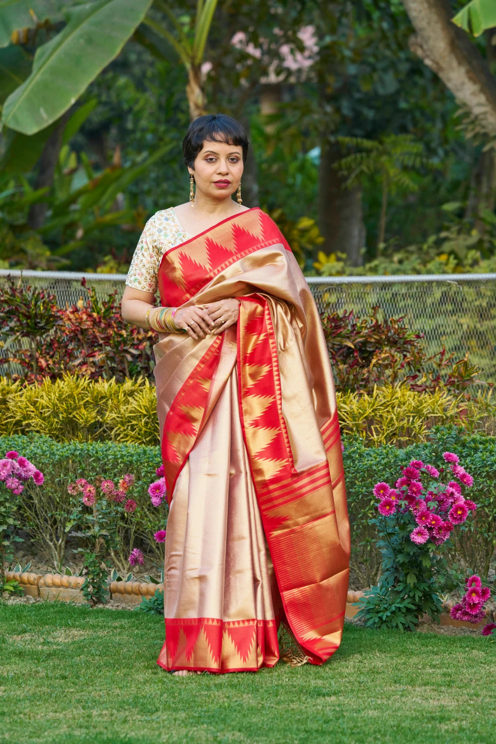 Majestic Champagne Gold Saree With Fiery Red Temple Border